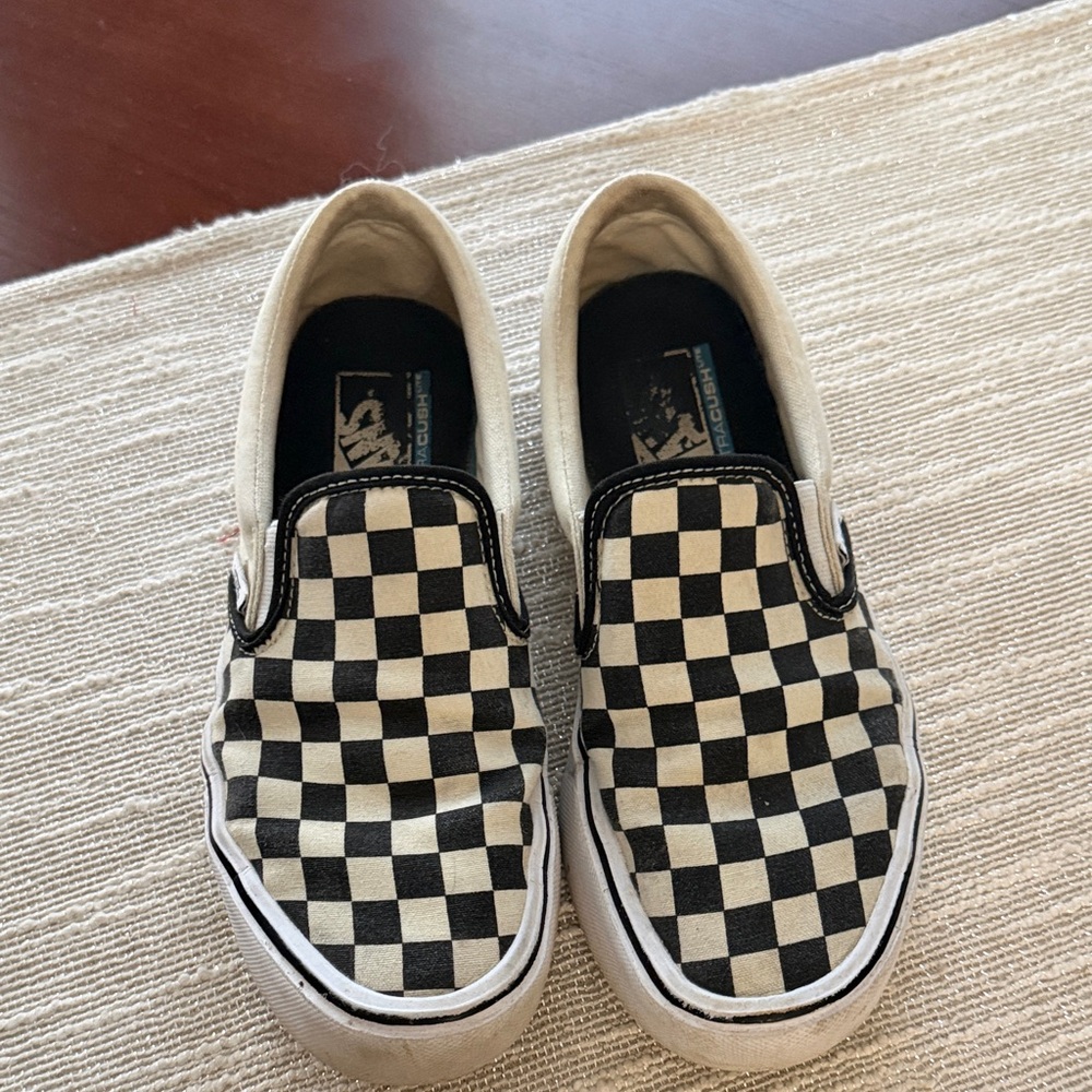 Vans Black and White Checkered Slip-Ons